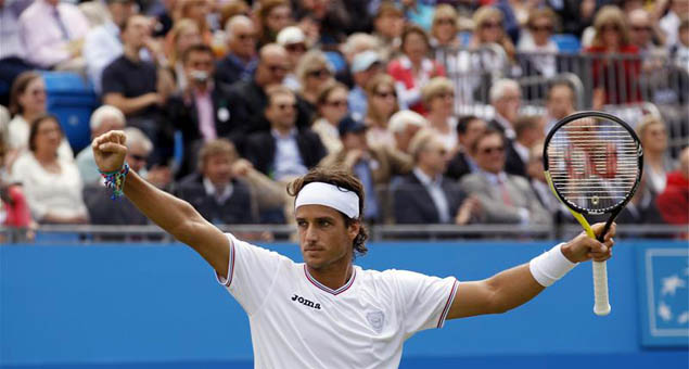 Feliciano Lopez celebrates his victory against Rafa Nadal