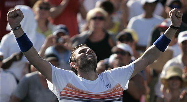 Mardy Fish reacts after wining the Trophy