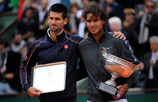 Rafael Nadal (R) with French Open 2012 Trophy